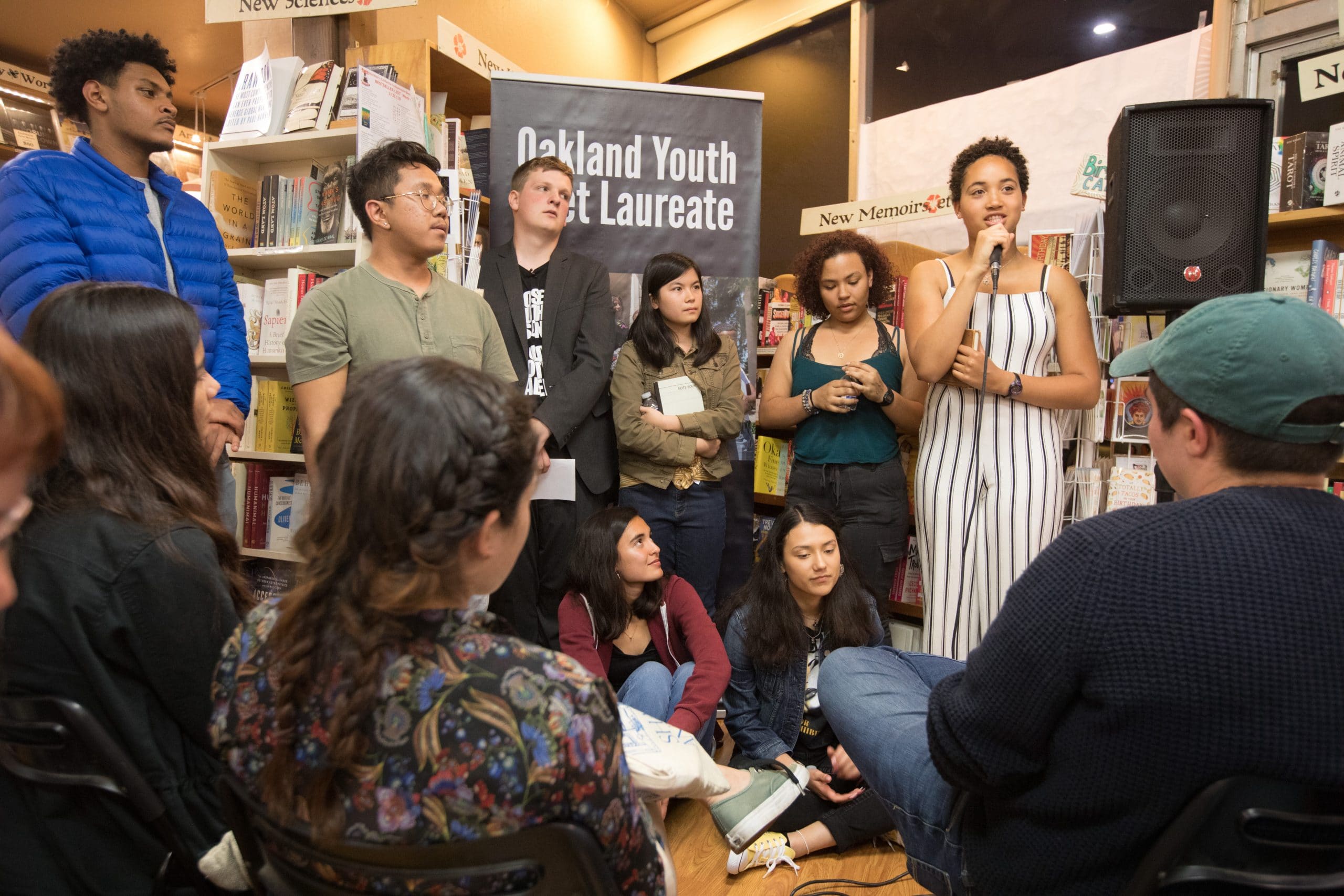 This year's finalists for the Oakland Youth Poet Laureate perform, with their judges, at Pegasus Books on College Ave in Oakland on April 19, 2019.